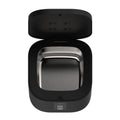 Real photo from above: the lid open, the four flush UV-C chips recessed in the lid, and the removable stainless steel basin